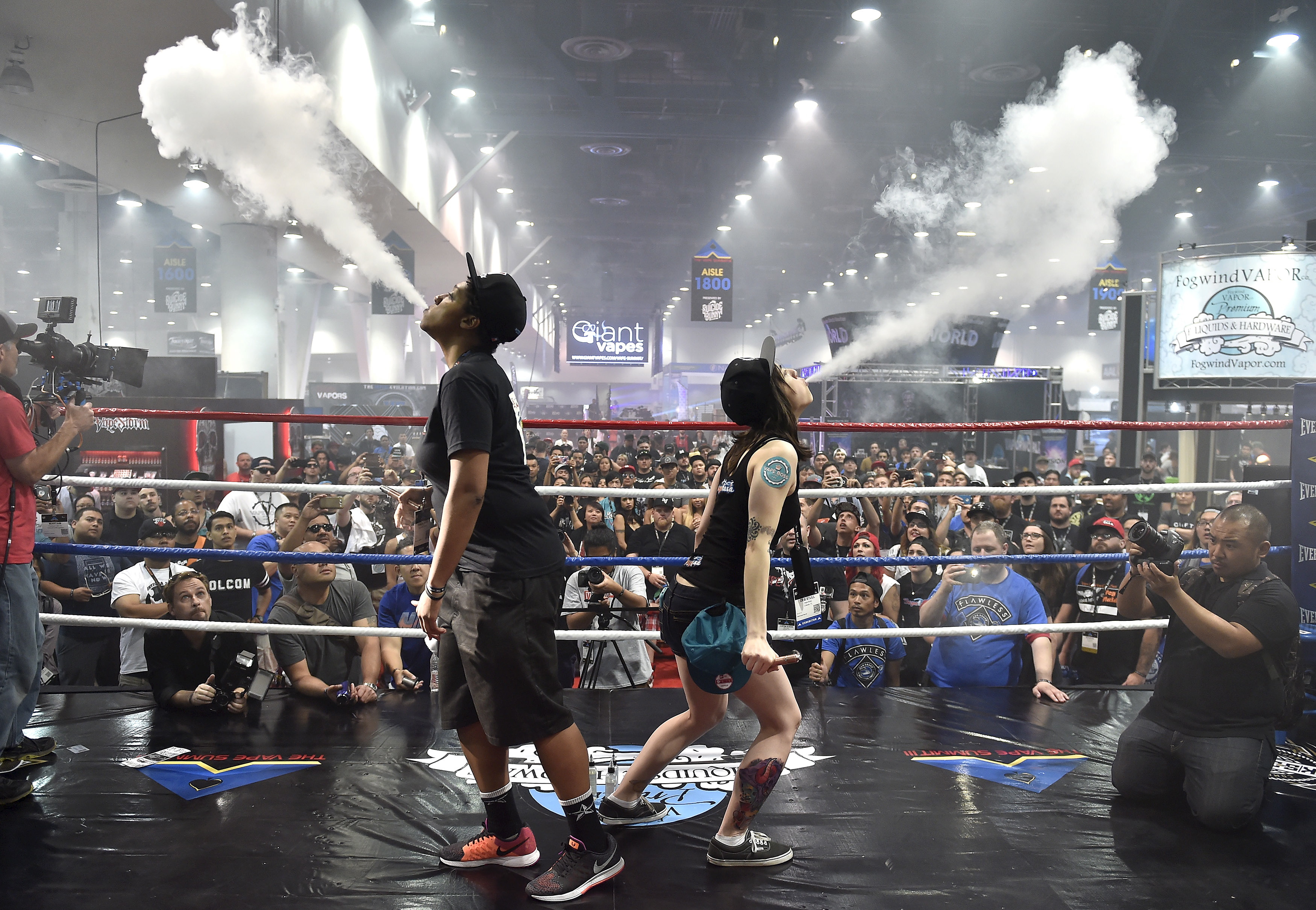 Tricks are one of the reasons teens get into vaping, some research suggests. Here, spectators watch the biggest vape cloud competition at the Vape Summit 3 in Las Vegas, Nev., in May 2015. (David Becker/Reuters)