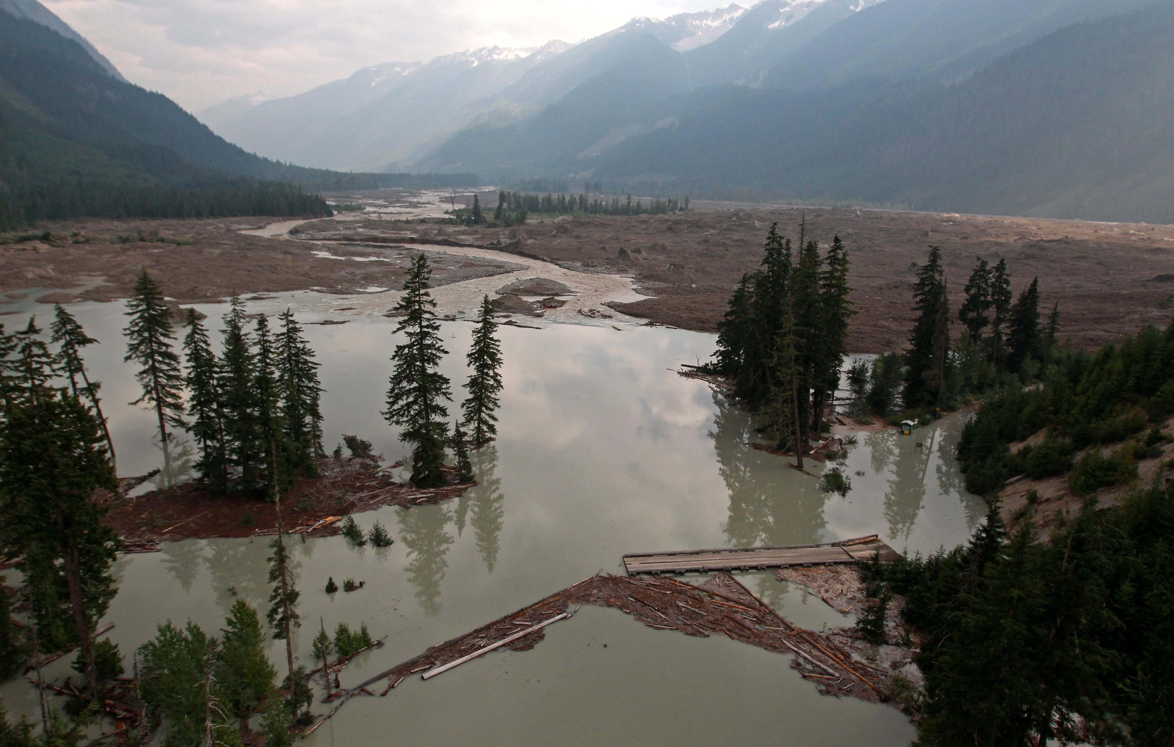 The remains of a bridge that crossed Meager Creek sits in the debris field after a massive avalanche of rock and snow barrelled down a mountainside on Aug. 6, 2010. Seismic waves were felt as far away as Alaska and Washington state. (Darryl Dyck/Canadian Press)