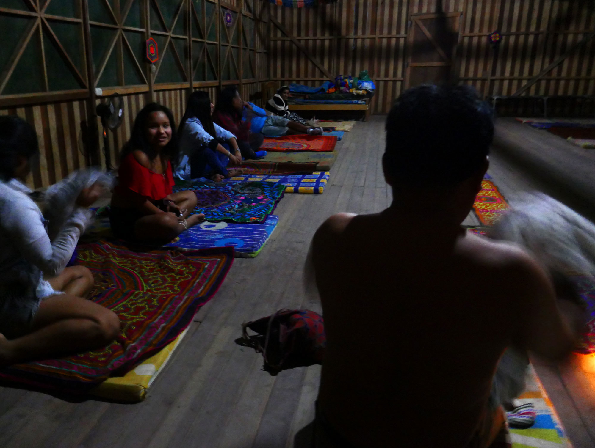 An ayahuasca trip can take several hours. Participants lie on mats in the dark and fall into a dreamlike state while a shaman sings spiritual songs. (Mark Kelley/CBC) 